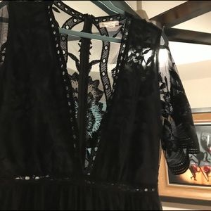 beautiful shorts romper with a long lace skirt